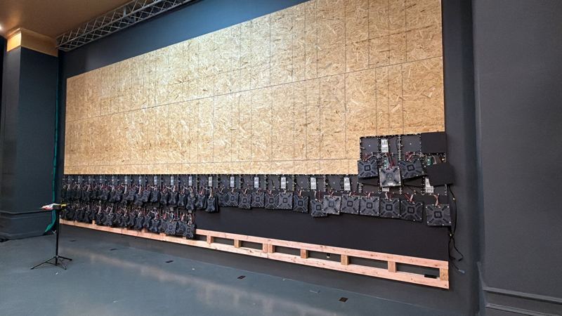 Mounting frame and first cabinet rows going up on the main wall